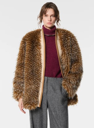 GIACCA CON BORDI IN MAGLIA...